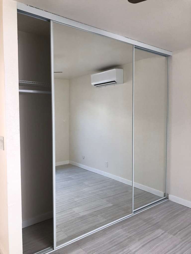 new-beautiful-wardrobe-mirror-closet-doors-in-front-unit-remodel 