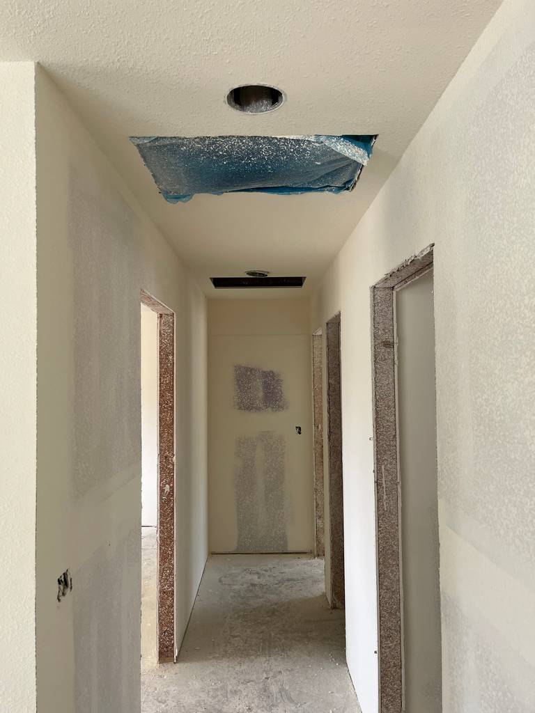 Ceiling, wall, and hallway finishing with joint compound.
