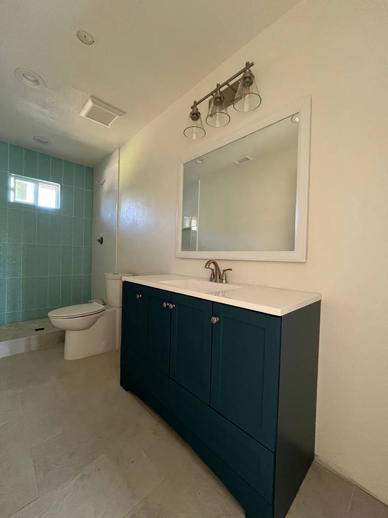 Elegant bathroom with custom features and classic design