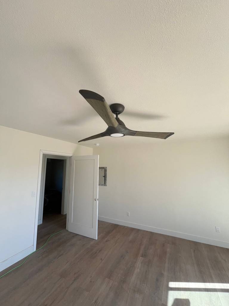 Propeller ceiling fan inset light energy-efficient powerful motor air movement whisper-quiet.