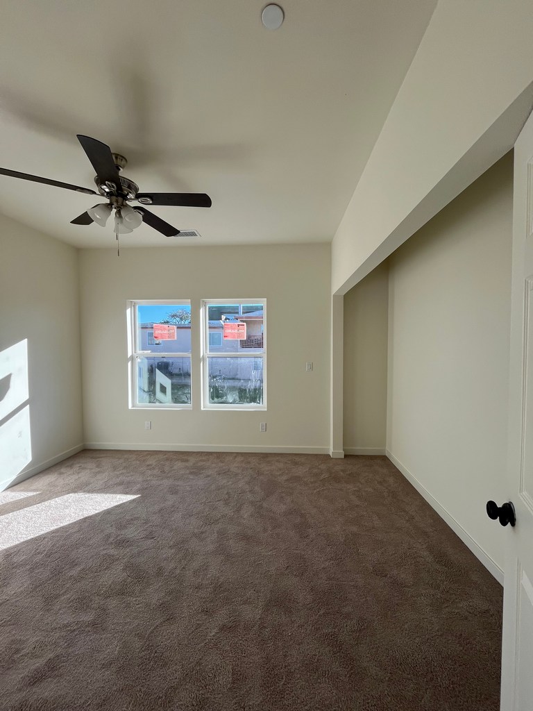 Finished bedroom with carpet