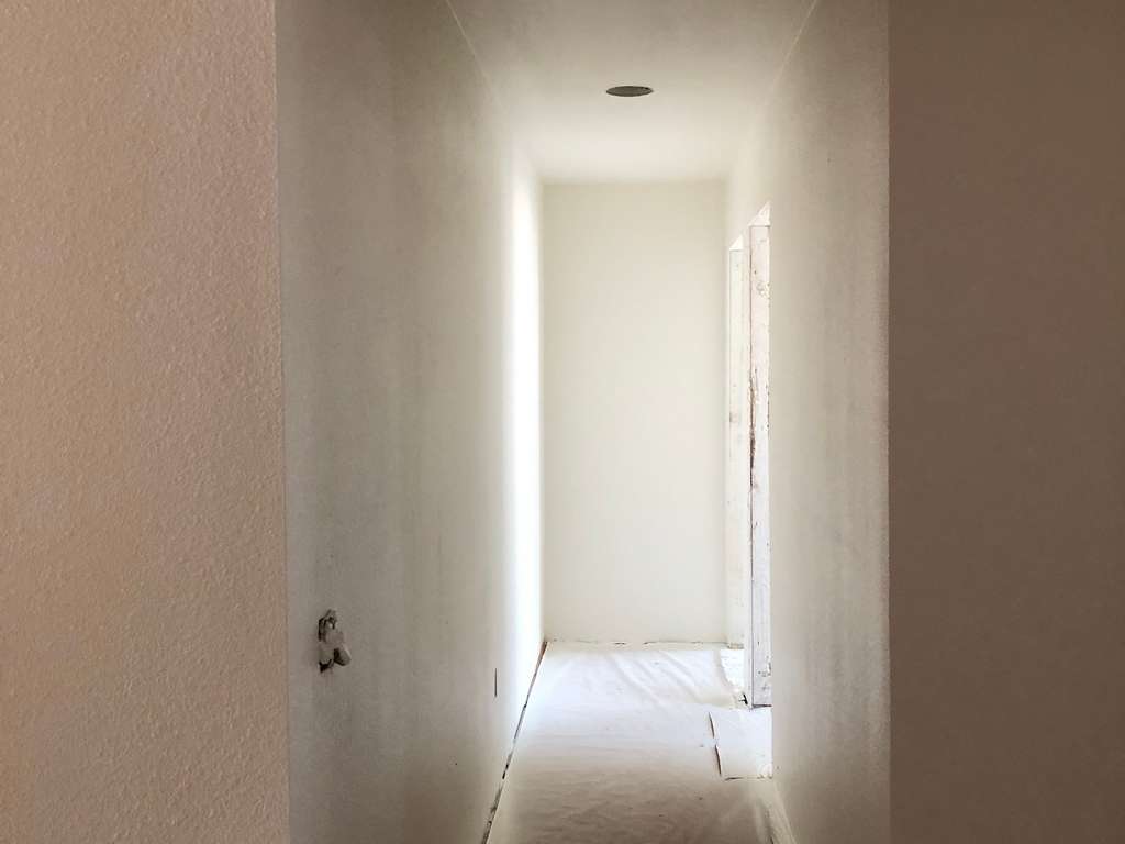 ADU showing walls textured and ready for paint