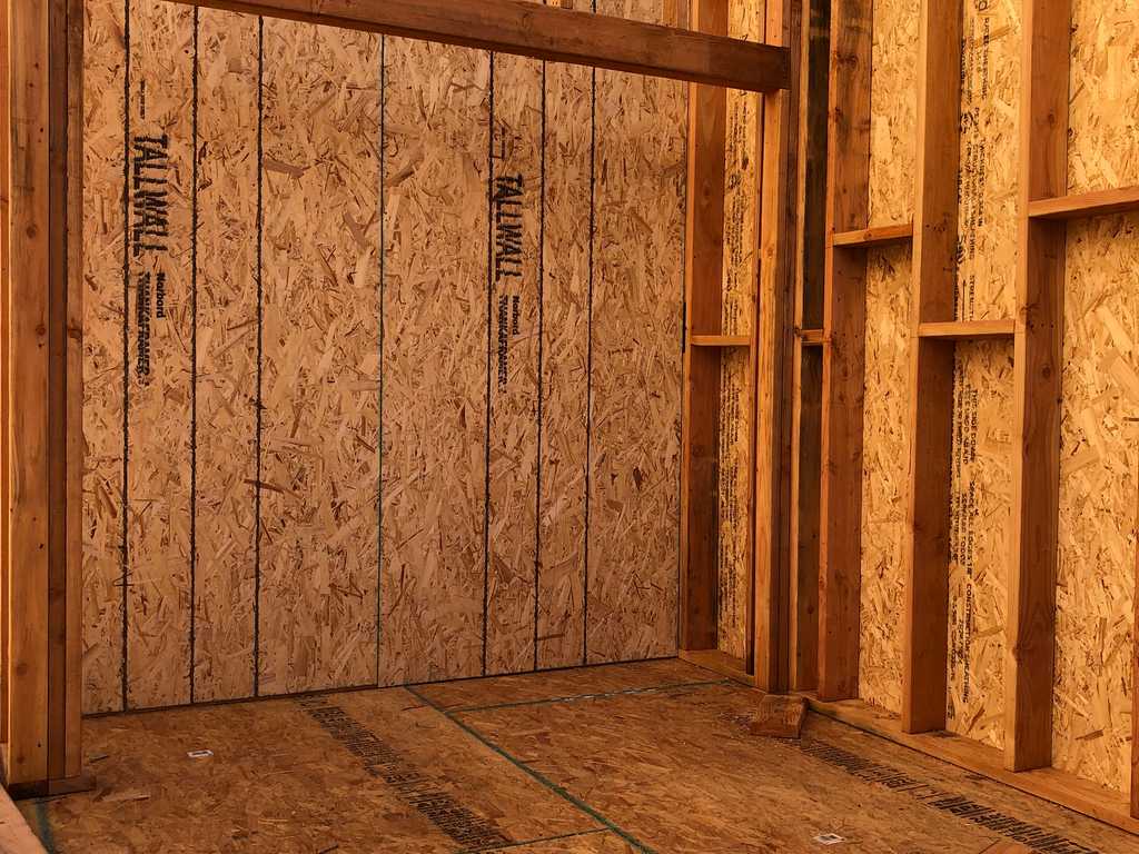 applying the subfloof and wall sheeting for an ADU