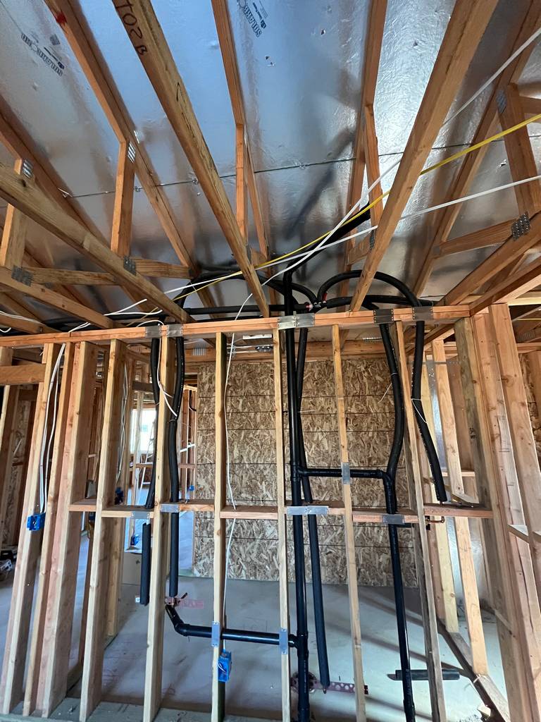 complex plumbing vent lines in open walls