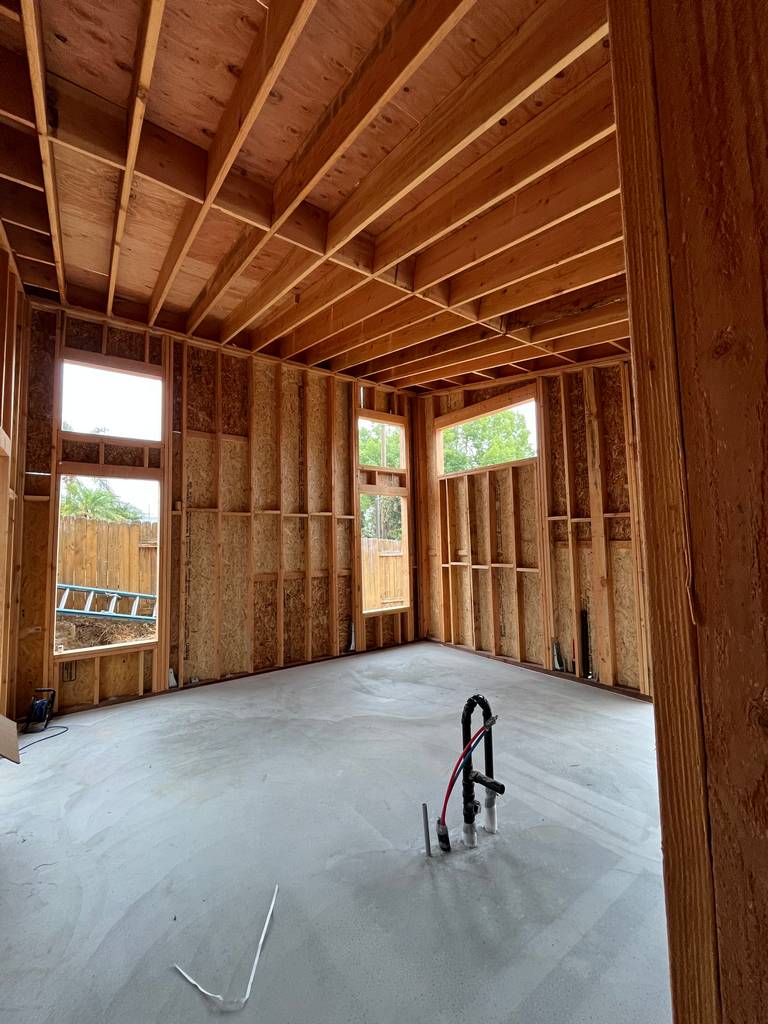  Construction progress of interior wall framing shown clearly..