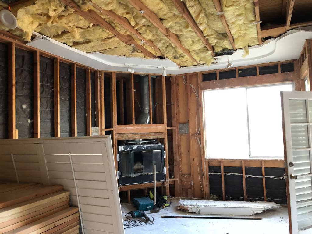 drywall is removed from walls and ceiling