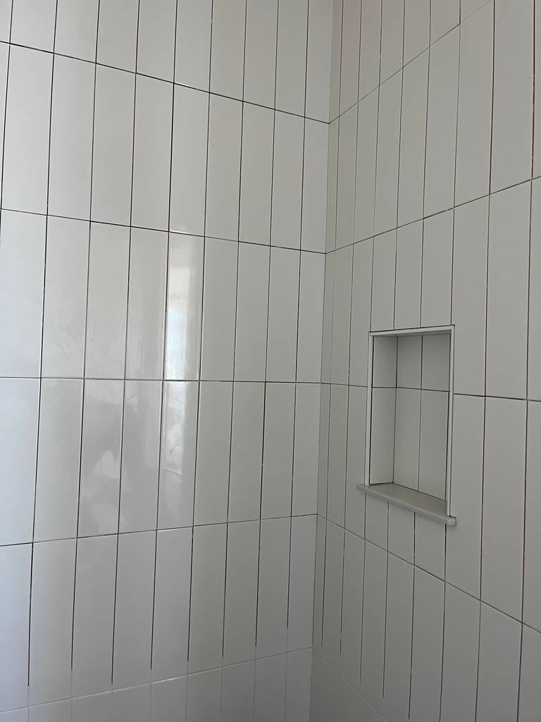 vertical subway tiles ready for grout