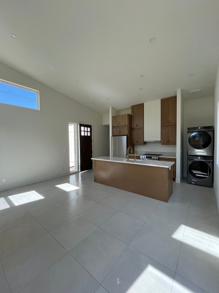 Open concept ADU kitchen living area.