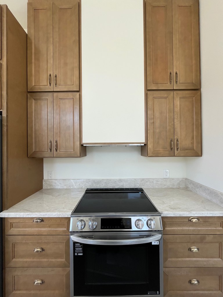 Kitchen range with cabinet installation.
