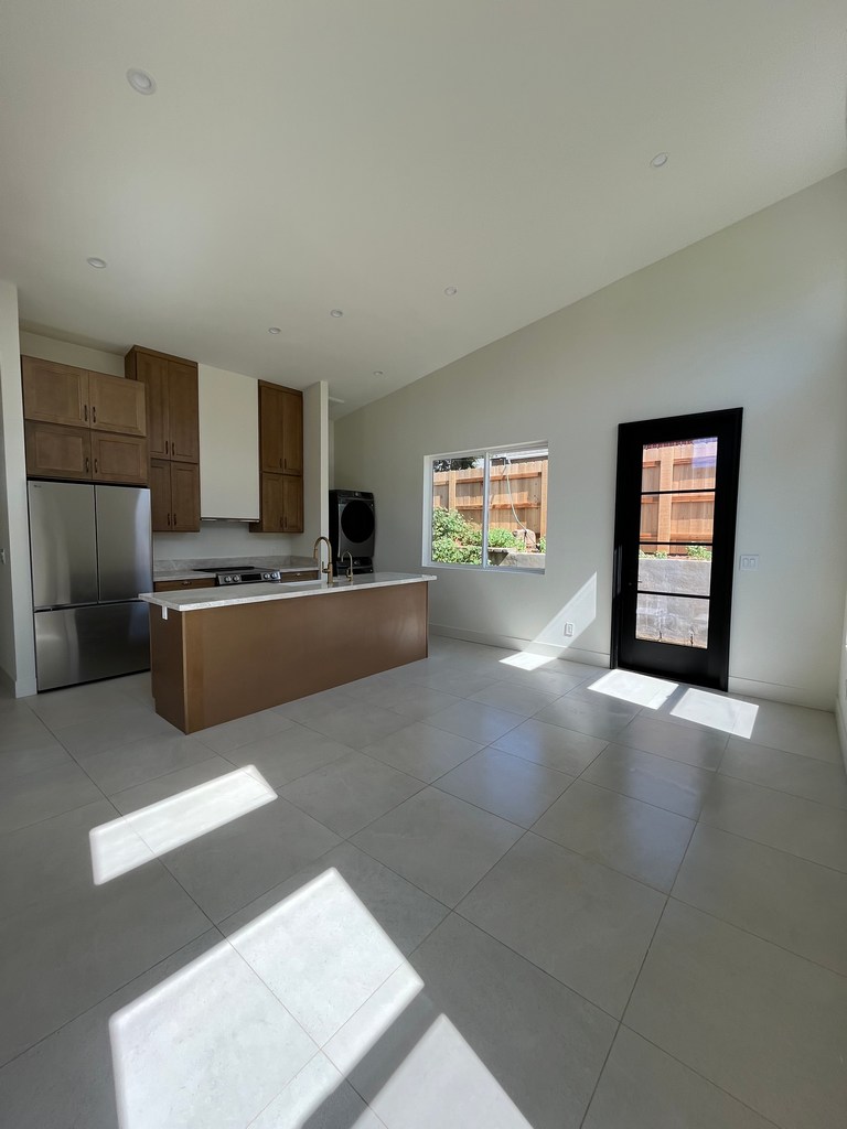 Finished ADU kitchen and living room.