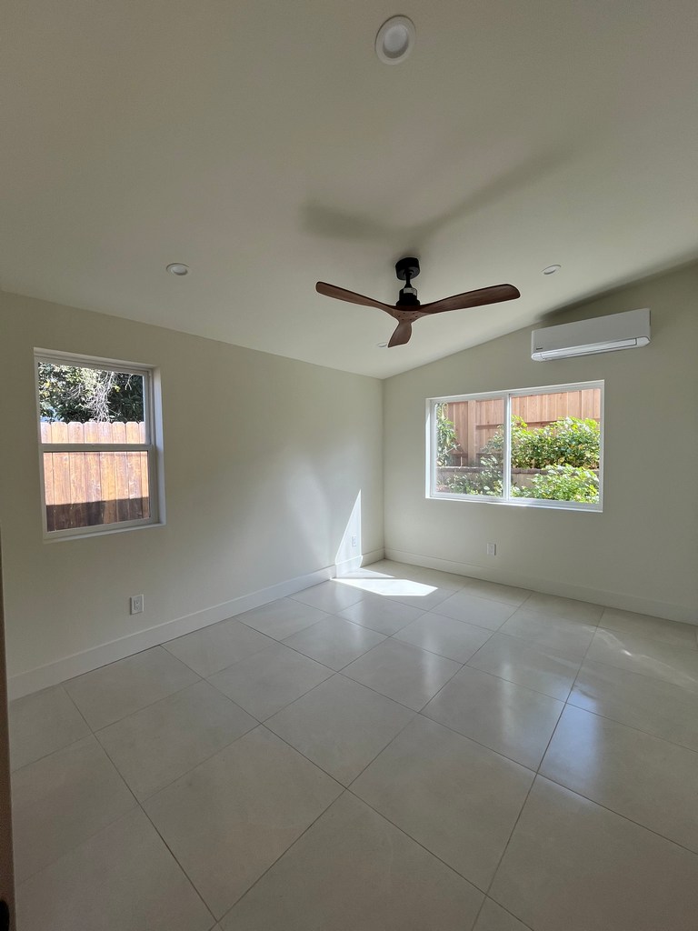 ADU bedroom large window interior.