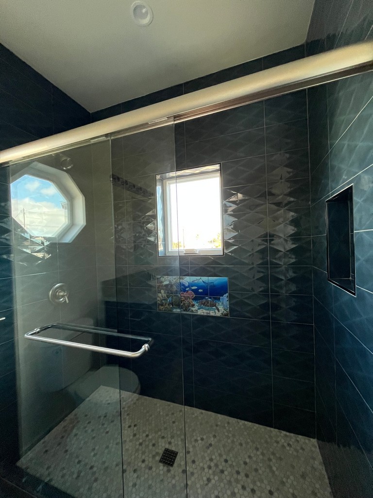 0302_glass shower dark wall tile