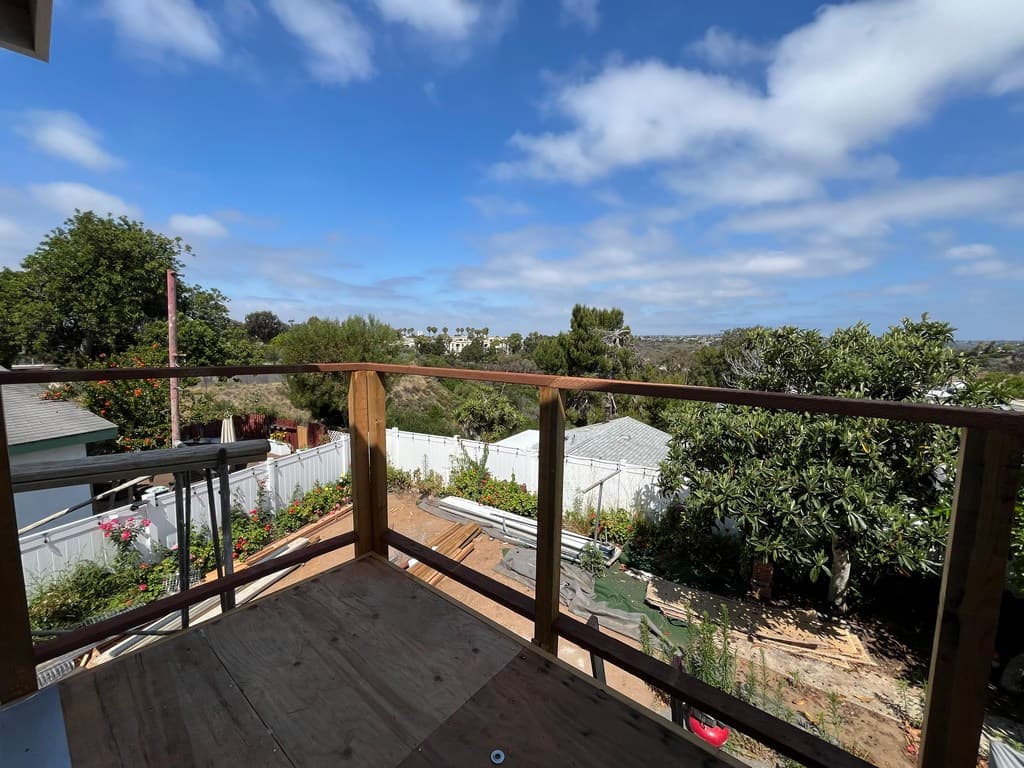 Wood balcony railing framing for garage ADU.