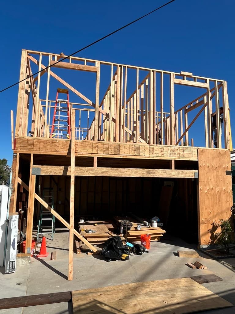 Framed upper-level ADU over existing garage