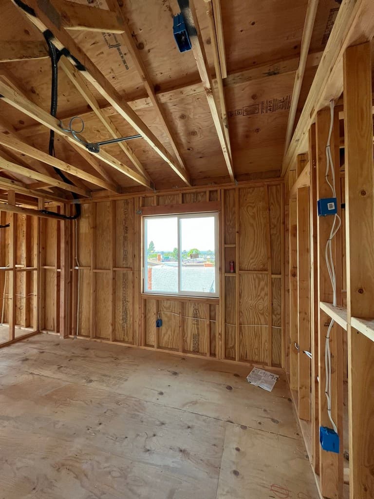 ADU window framing with rough electrical wiring.