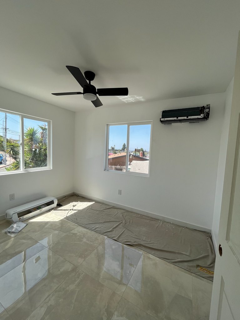 Guest room with mini-split and ceiling fan