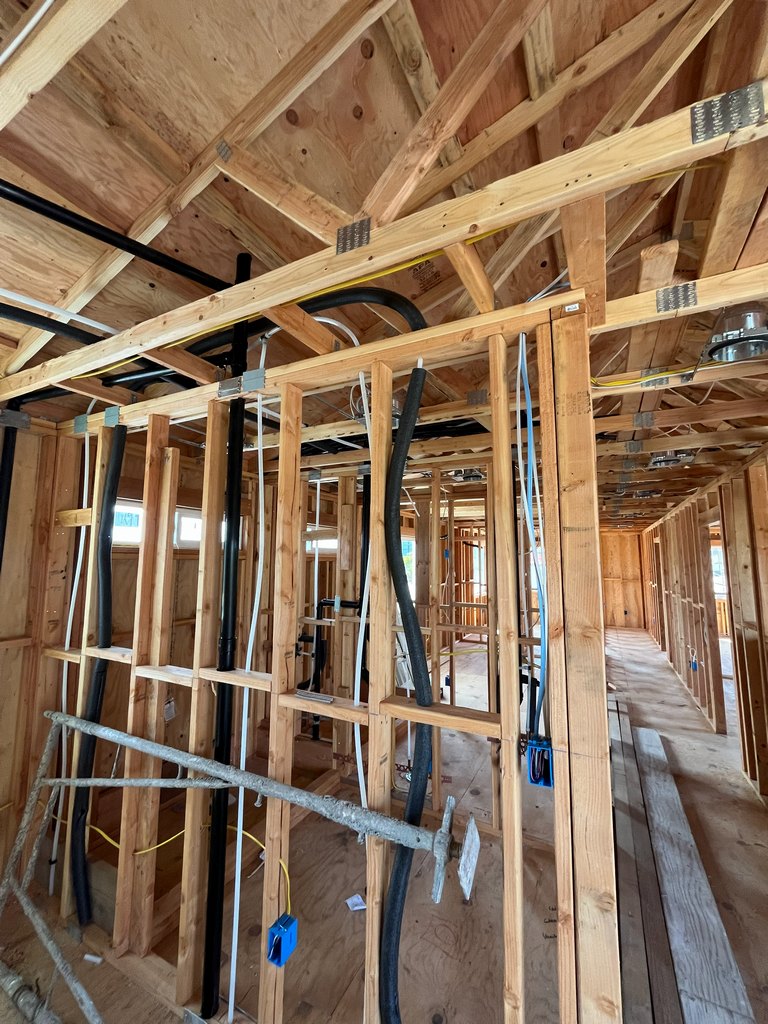 lumbing and insulated utility lines, electrical wiring, outlet boxes
