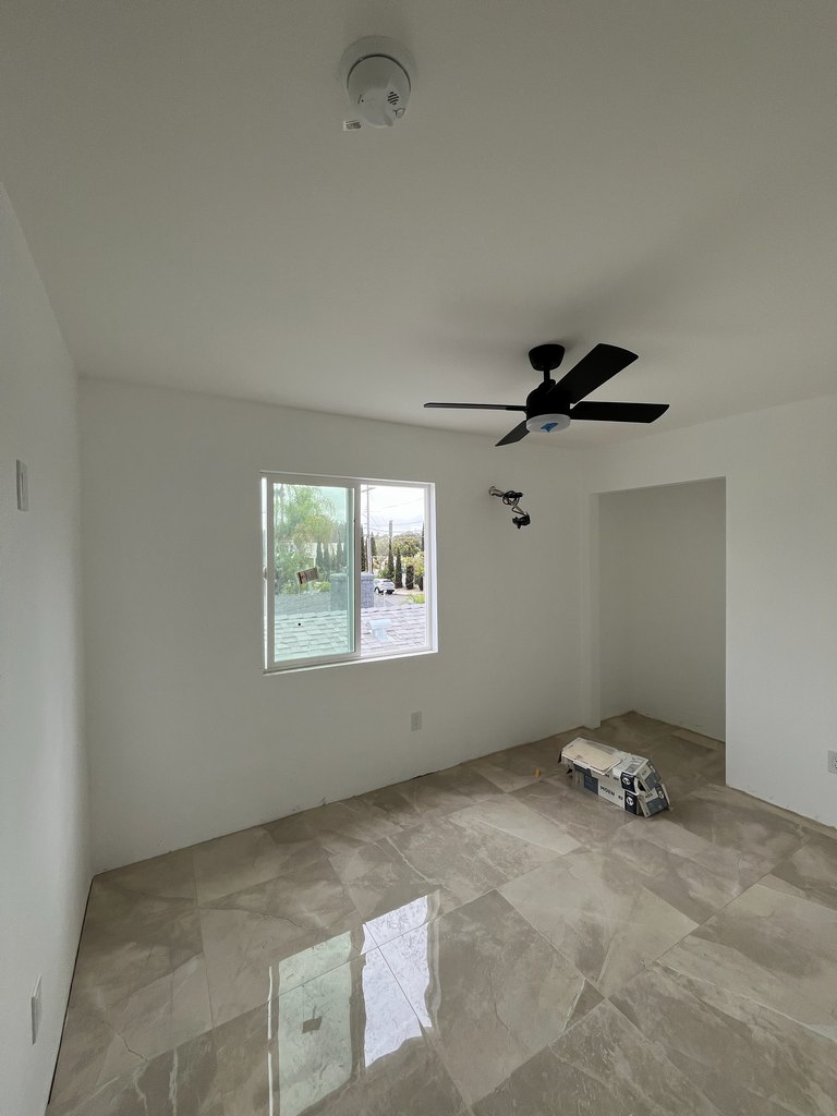 installed glossy tile flooring, ceiling fan, smoke alarm, sliding window