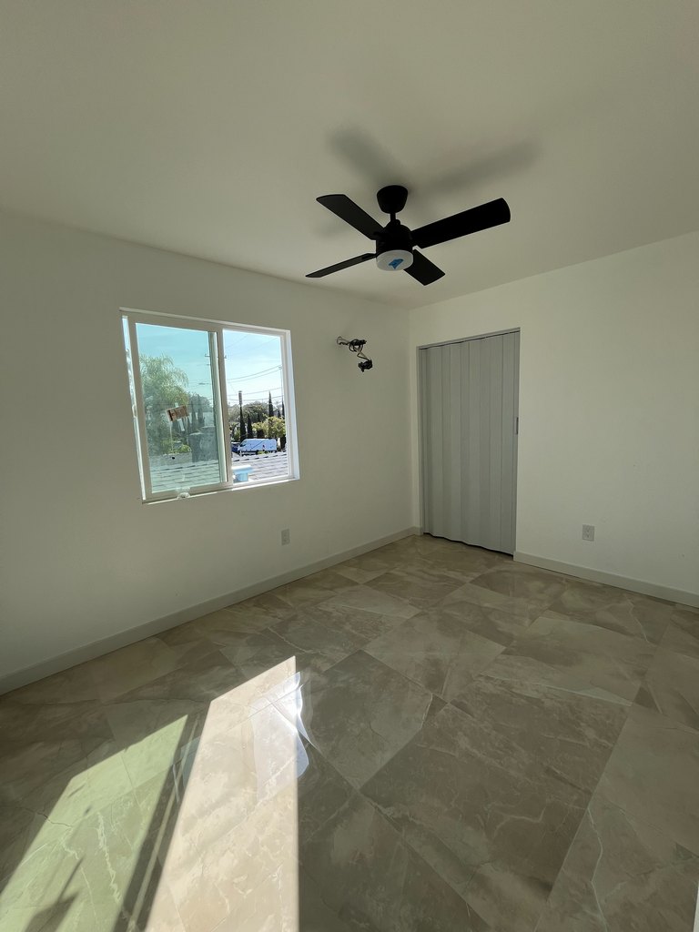 polished tile flooring, sliding window