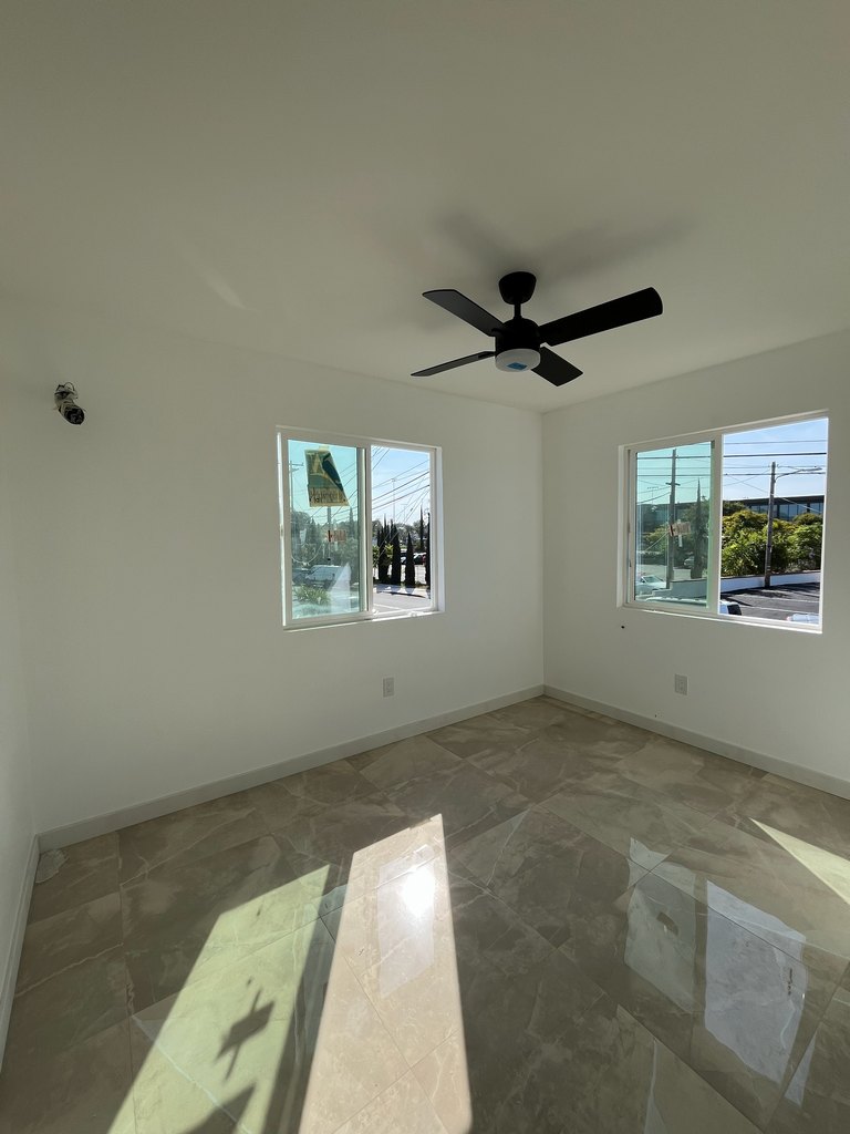 two sliding windows, glossy tile flooring