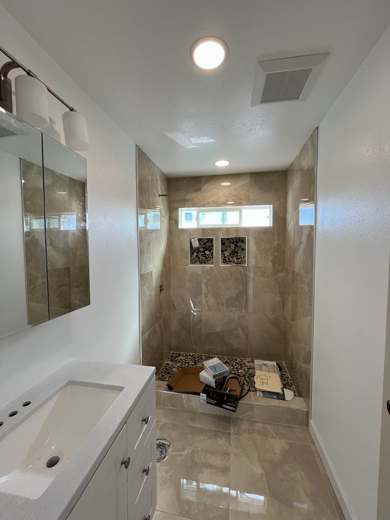 Bathroom vanity lighting and shower finishes