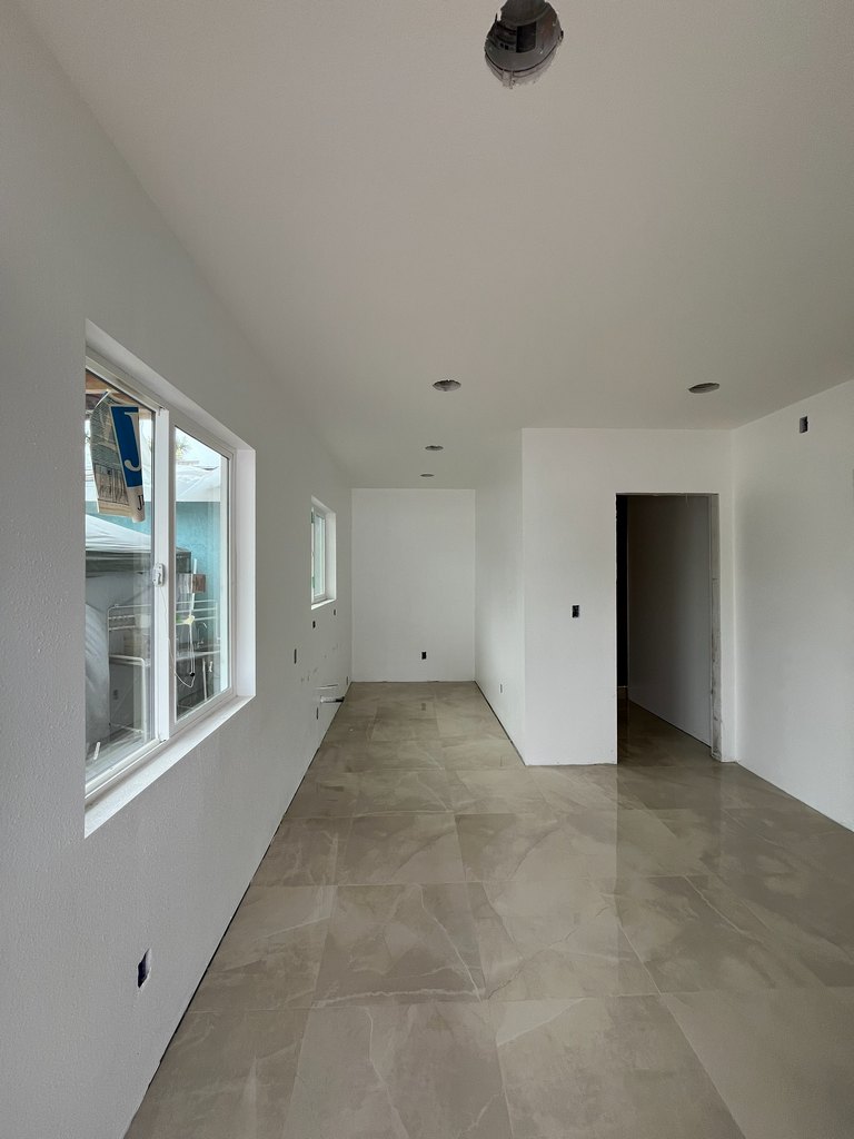 Tiled utility room with painted walls