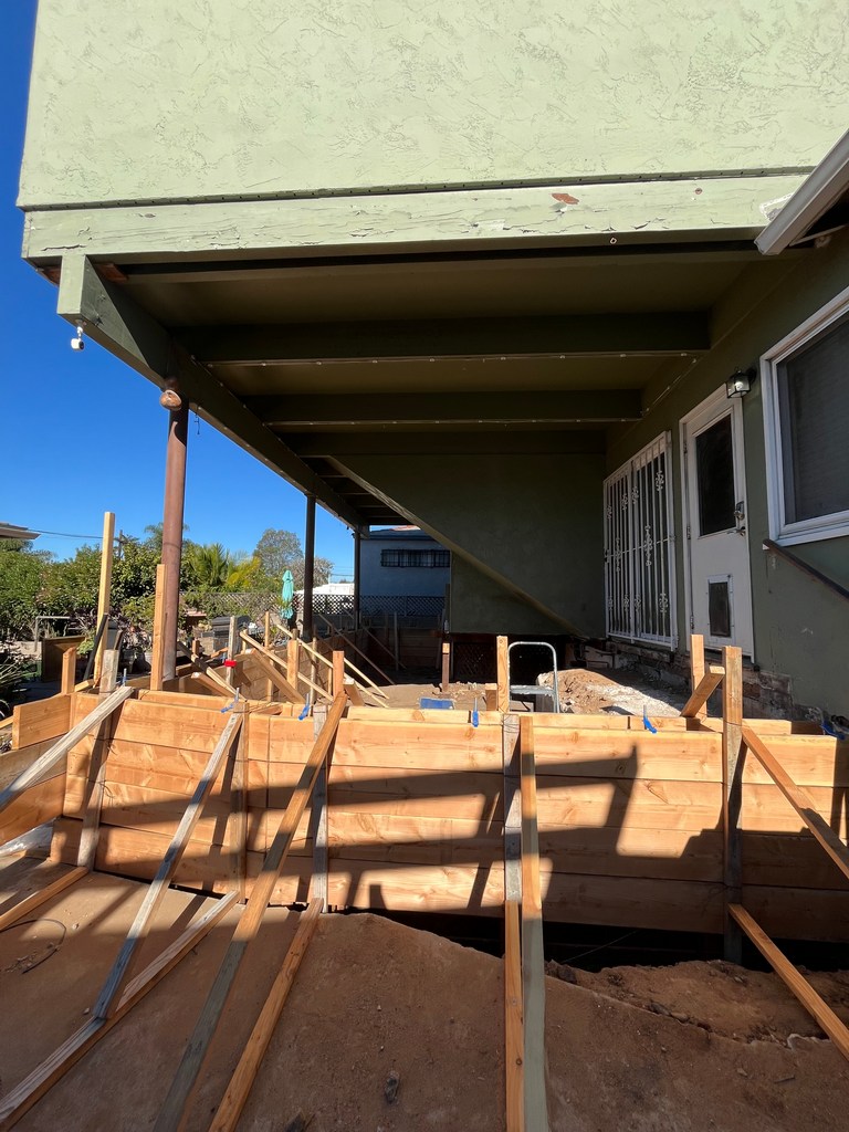 Foundation formwork installed for new addition showing perimeter boards and layout prior to concrete pour.