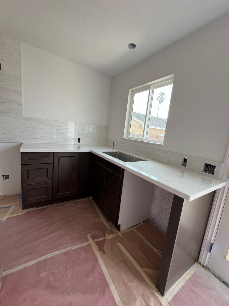 Kitchen sink countertop installation.