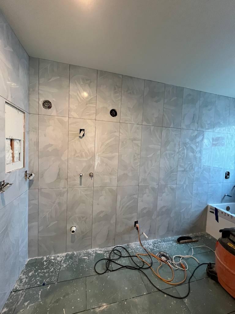 Tiled Bathroom Wall With  rough plumbing