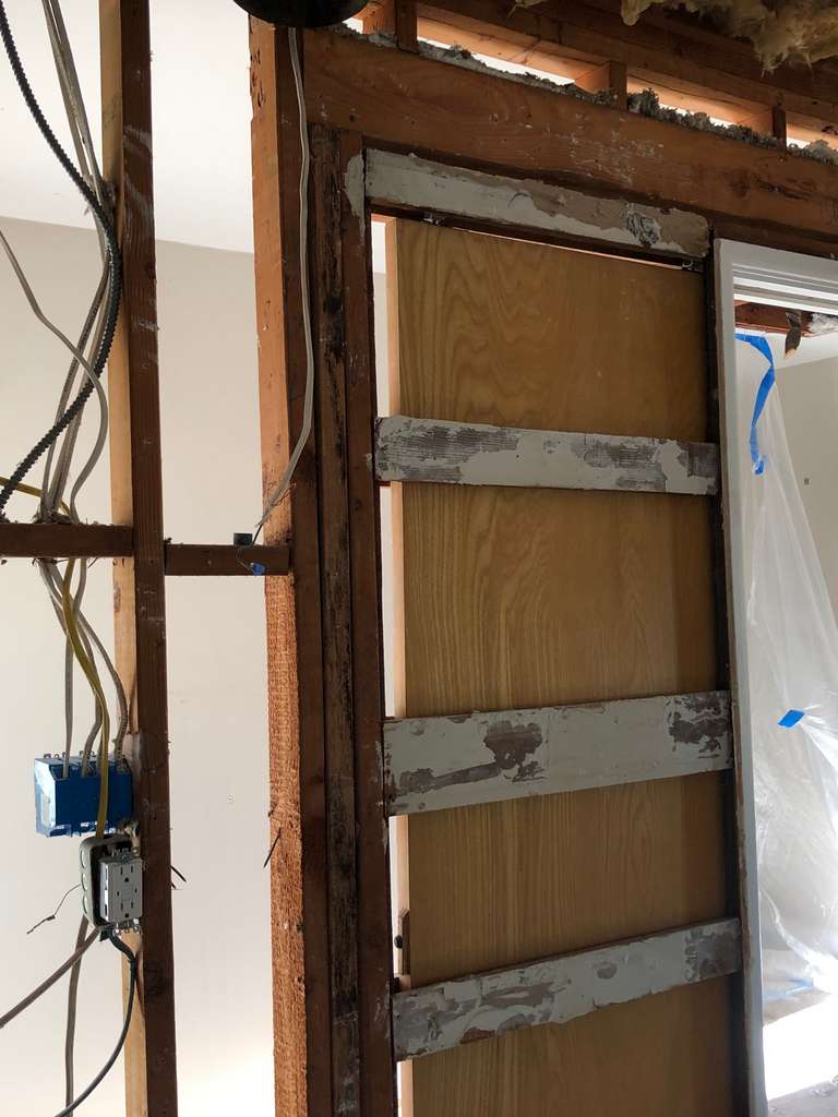 old-walls-removed-now-showing-frames-and-electrical-for-remodel