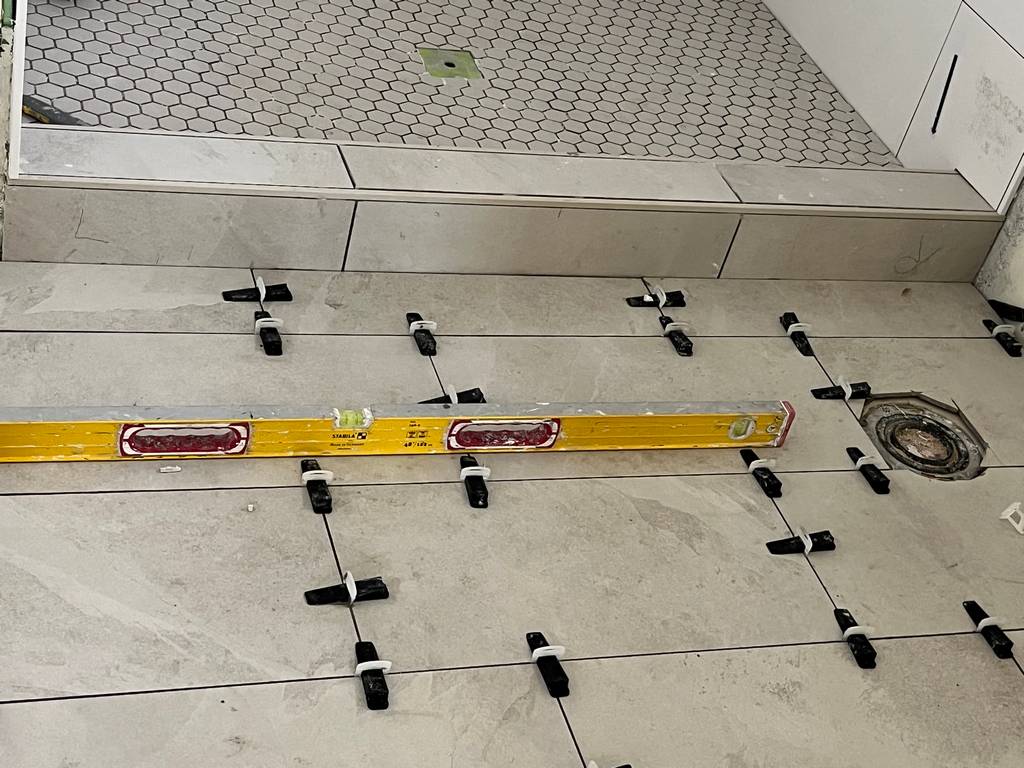 Leveling  Bathroom Floor Tiles with Adjustment Shims
