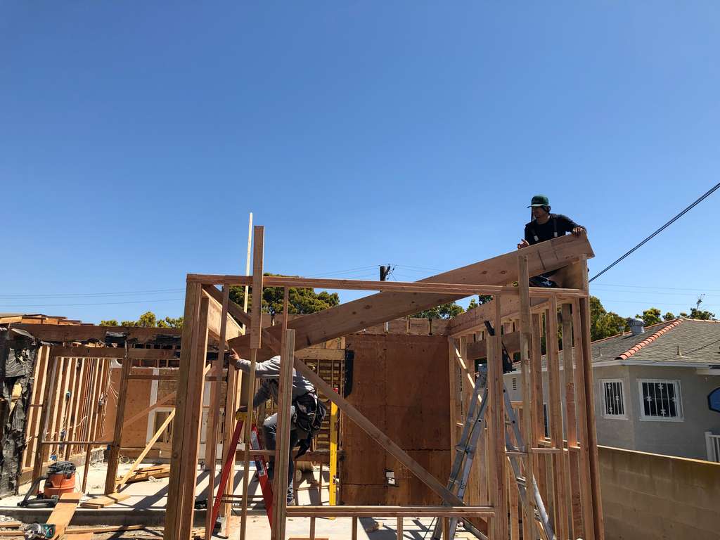 setting roof joist on the home addition