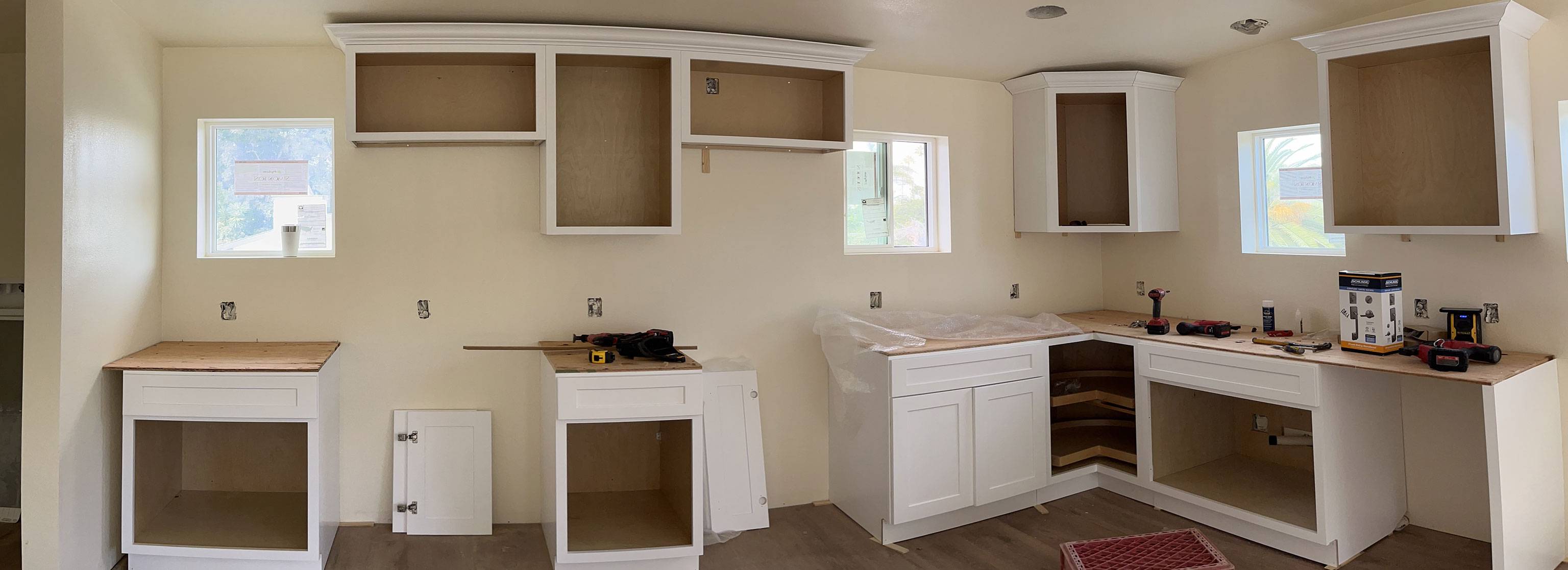 A2M Contractors custom base, wall, and diagonal corner ceiling-height kitchen cabinets