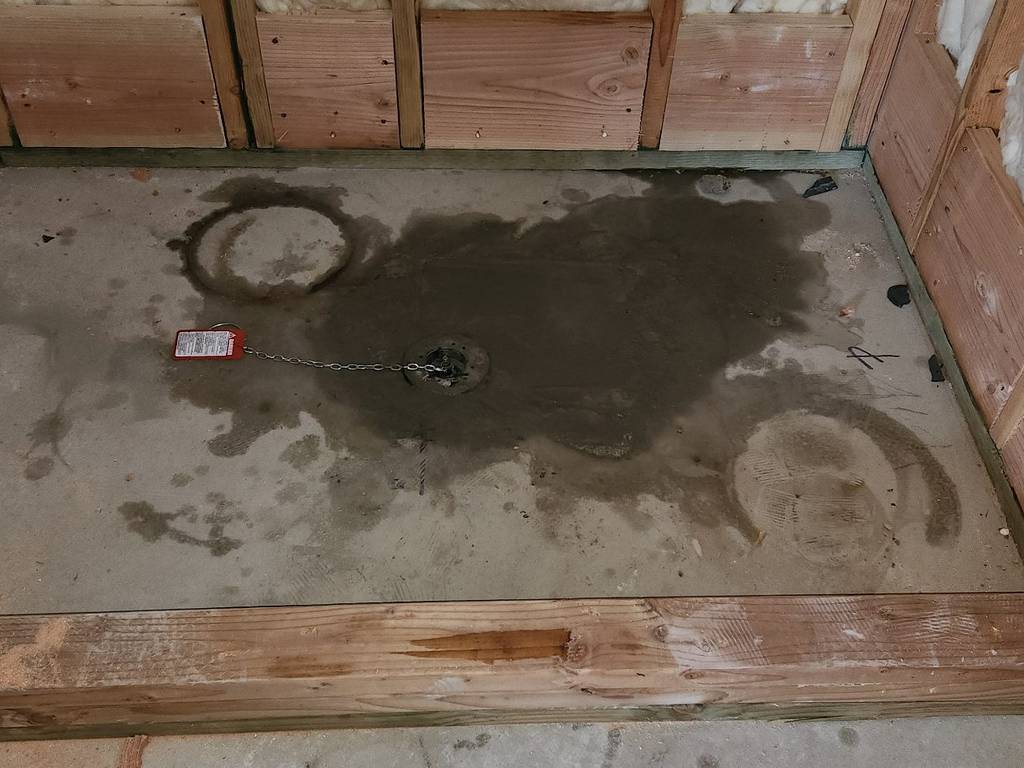 Shower drainpipe inspection at floor pan - Ensuring leak-free installation
