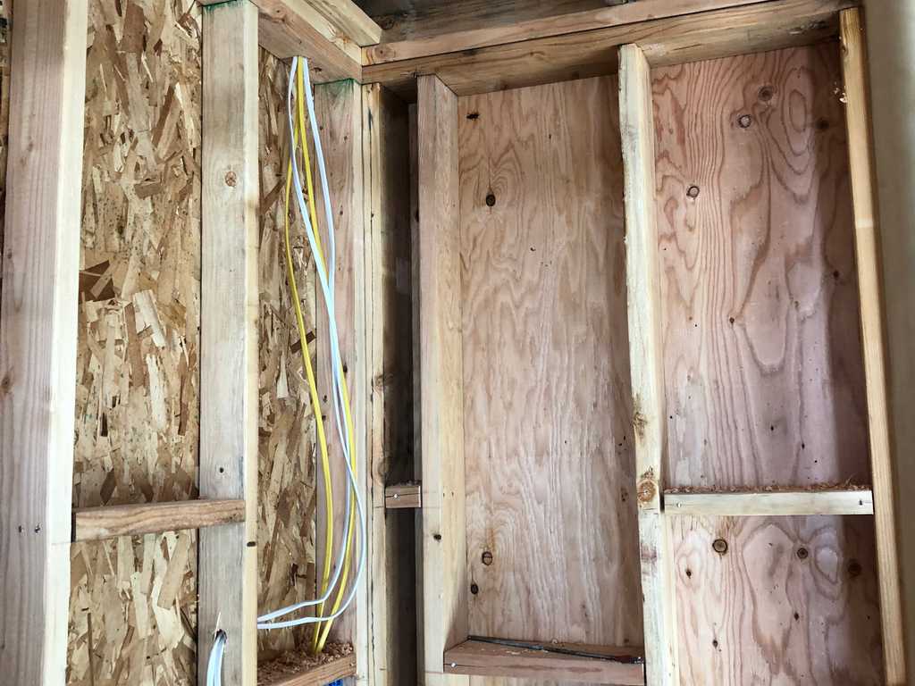 ADU showing frames, sheating panel, electrical work ready for drywall