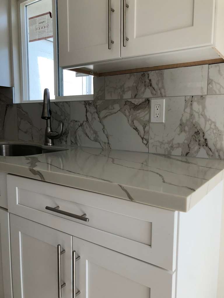 new-custom-designed-kitchen-showing-custom-cabinets-and-marble-countertop-front-unit-remodel