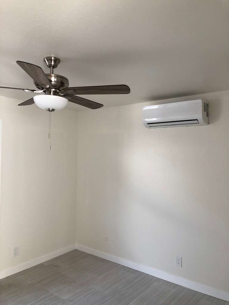 128_ADU%20showing%205%20blade%20ceiling%20fan%20and%20wall%20attached%20ac%20in%20the%20new%20bedroom.JPG