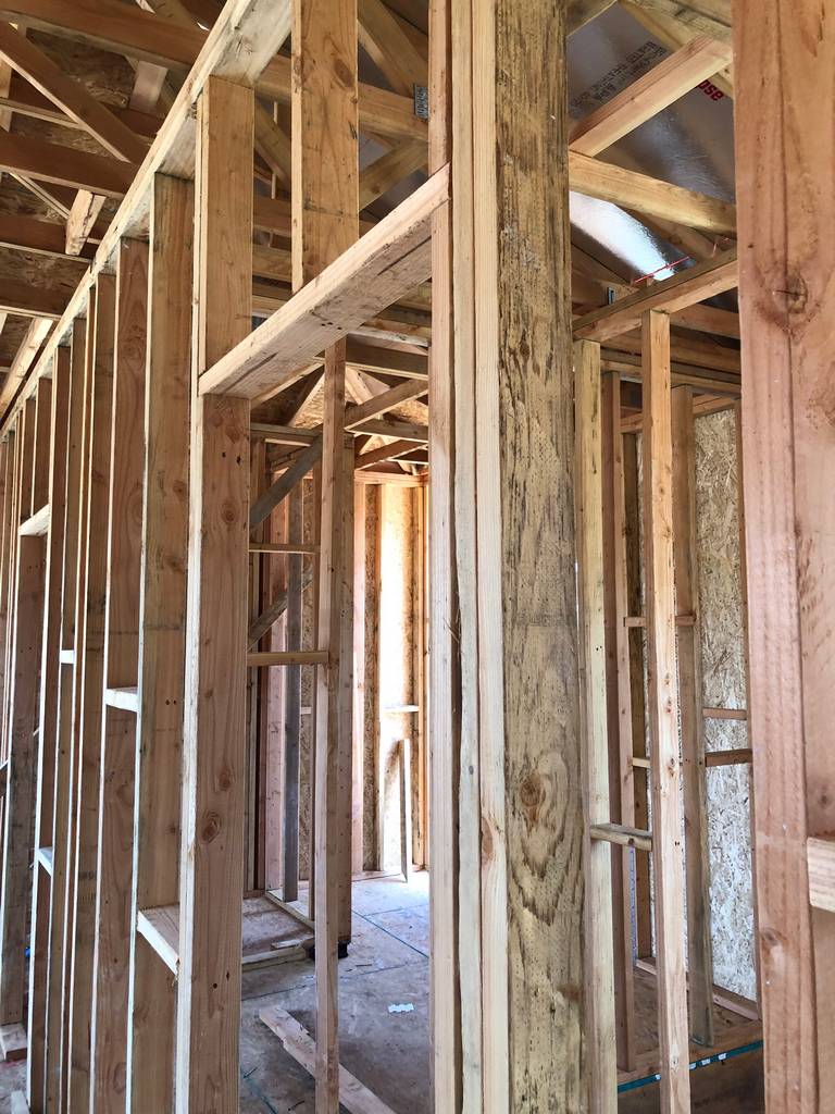 framing the inside walls of the home addition