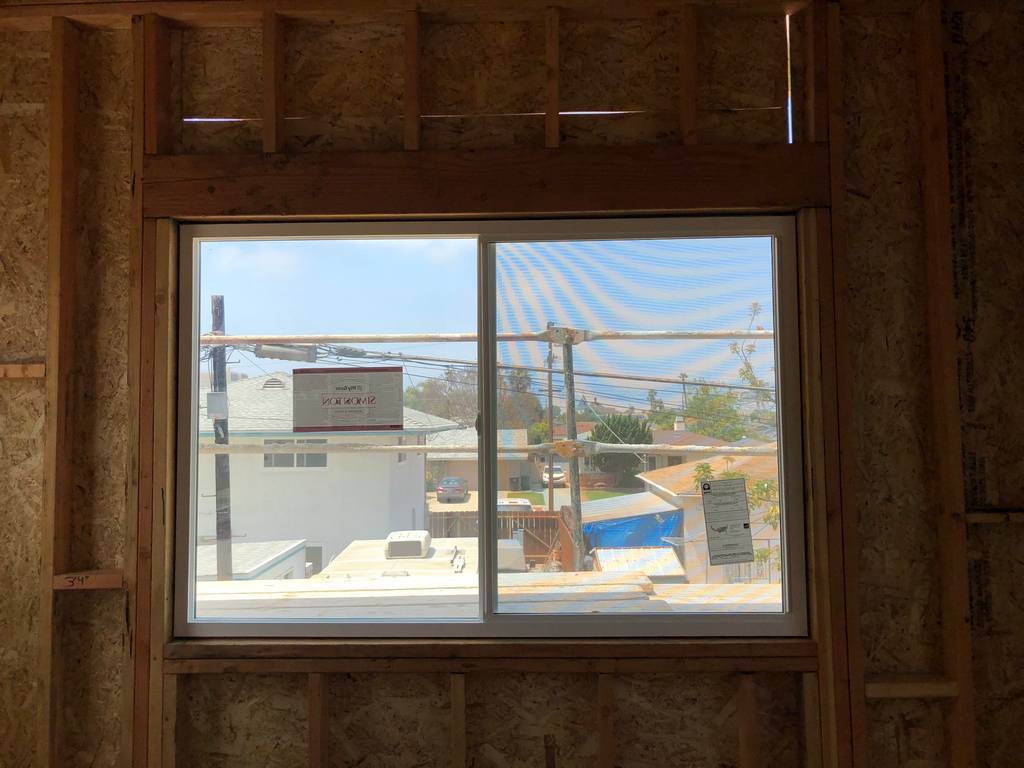 new vinyl sliding window in the home addition