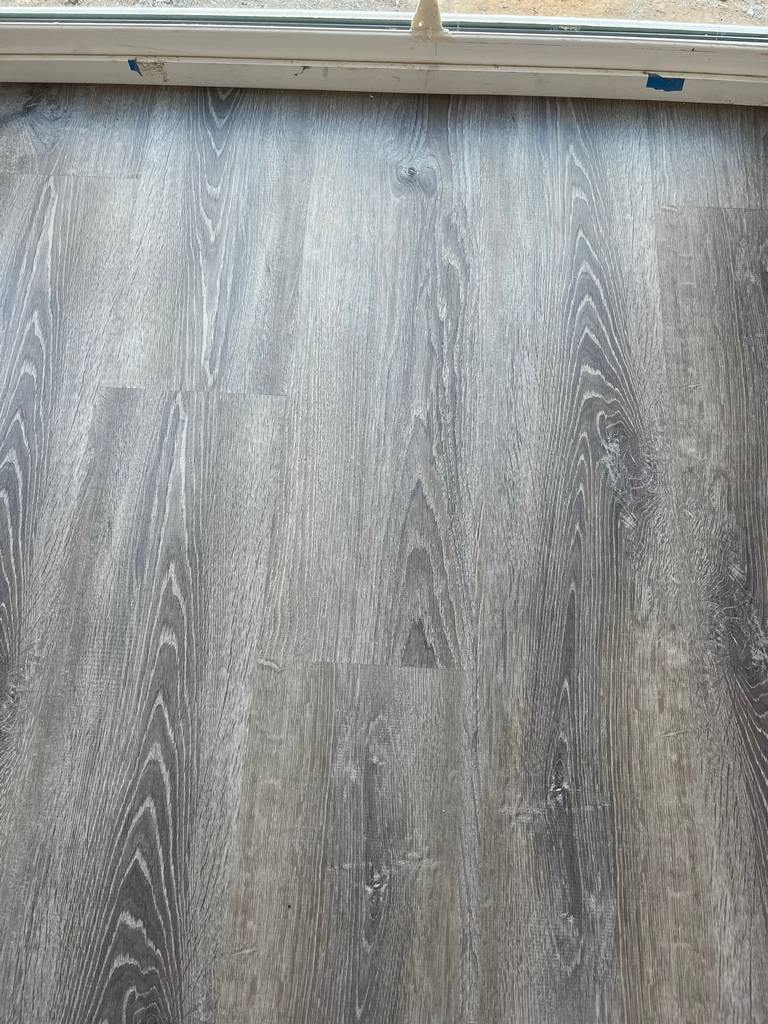 Crafted Pergo Wood Grain Flooring - Expert Carpentry