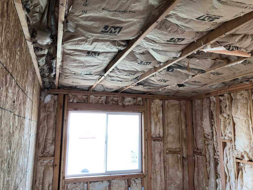 ADU wall framing, insulation with vinyle window