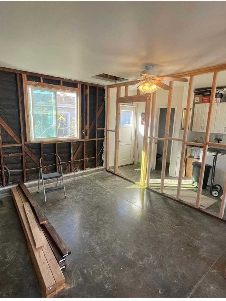 garage conversion showing wood framing