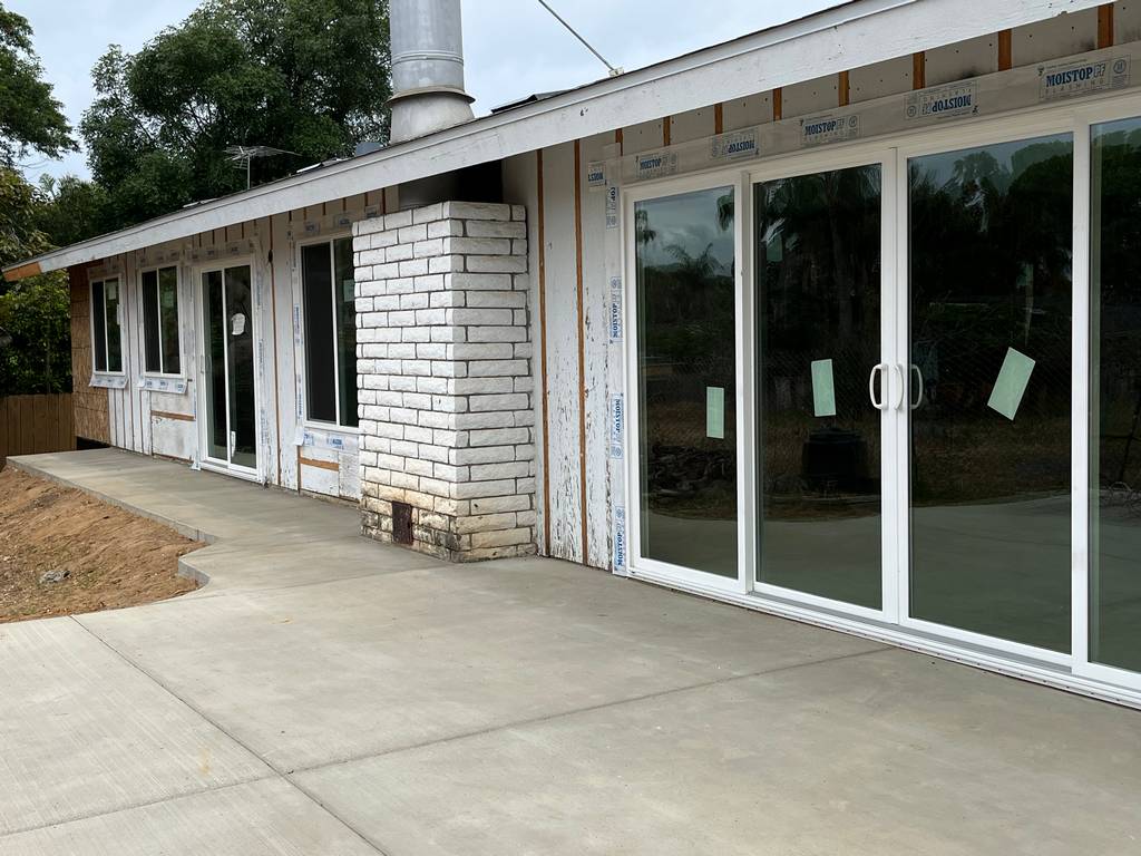 home addition showing the flashing around the wndows sliding glass doors