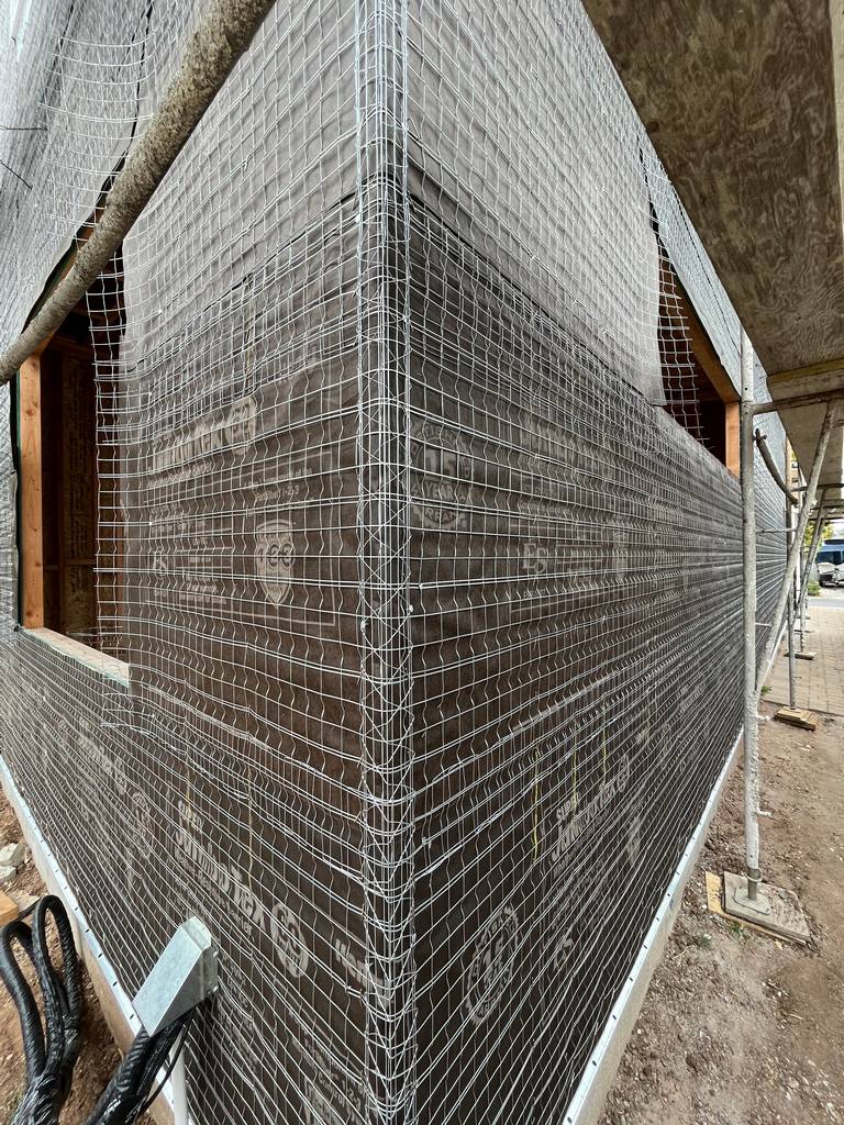 wire lath attached to exterior walls of the home addition