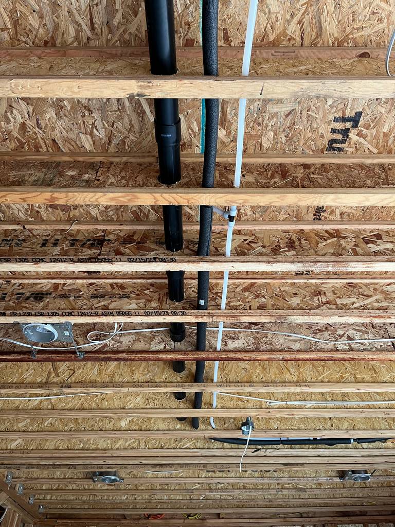 vent and plumbing pipes in the home addition