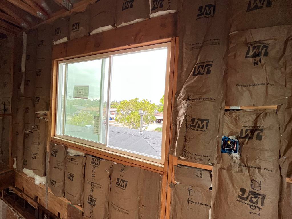 fiberglass in the inside walls of the home addition