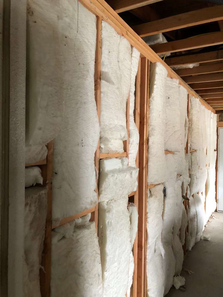 fiber-insulation-installed-in-stud-walls