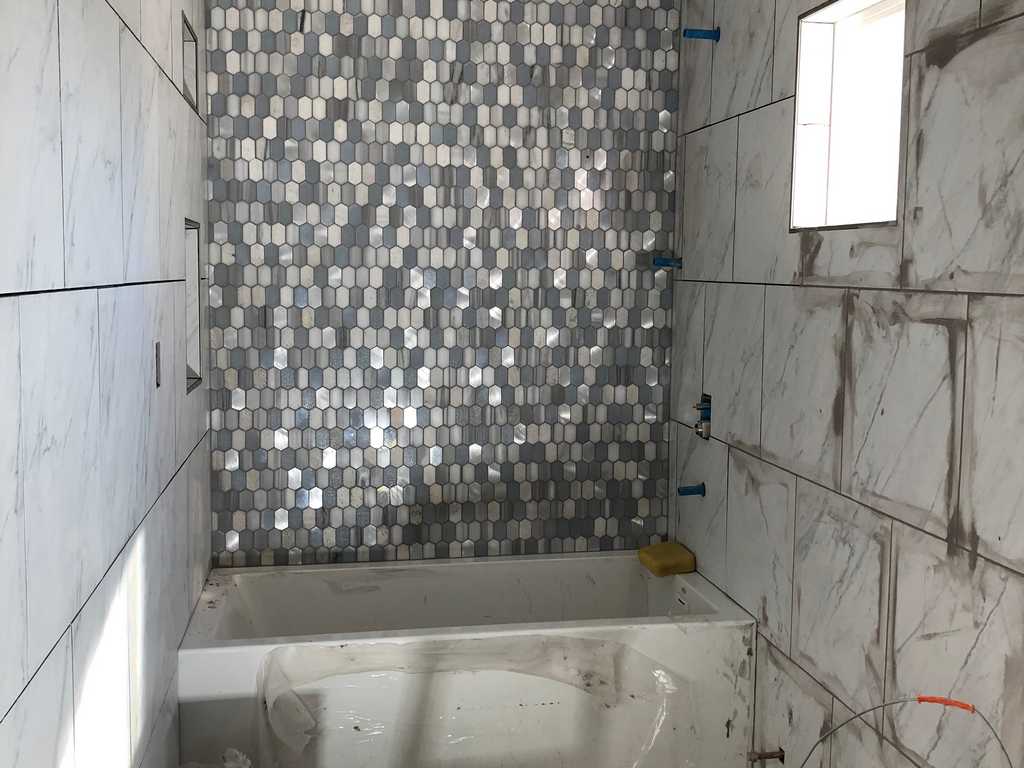 getting ready to grout the bathroom tiled walls