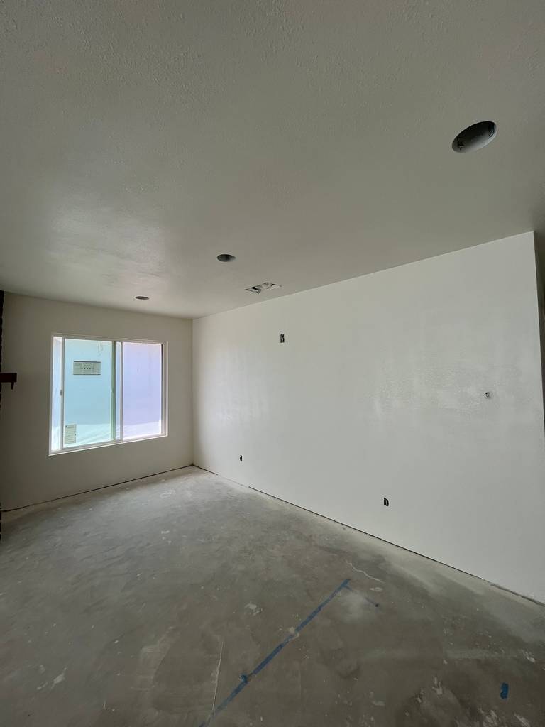 Drywall Finishers Skillful Texture Application