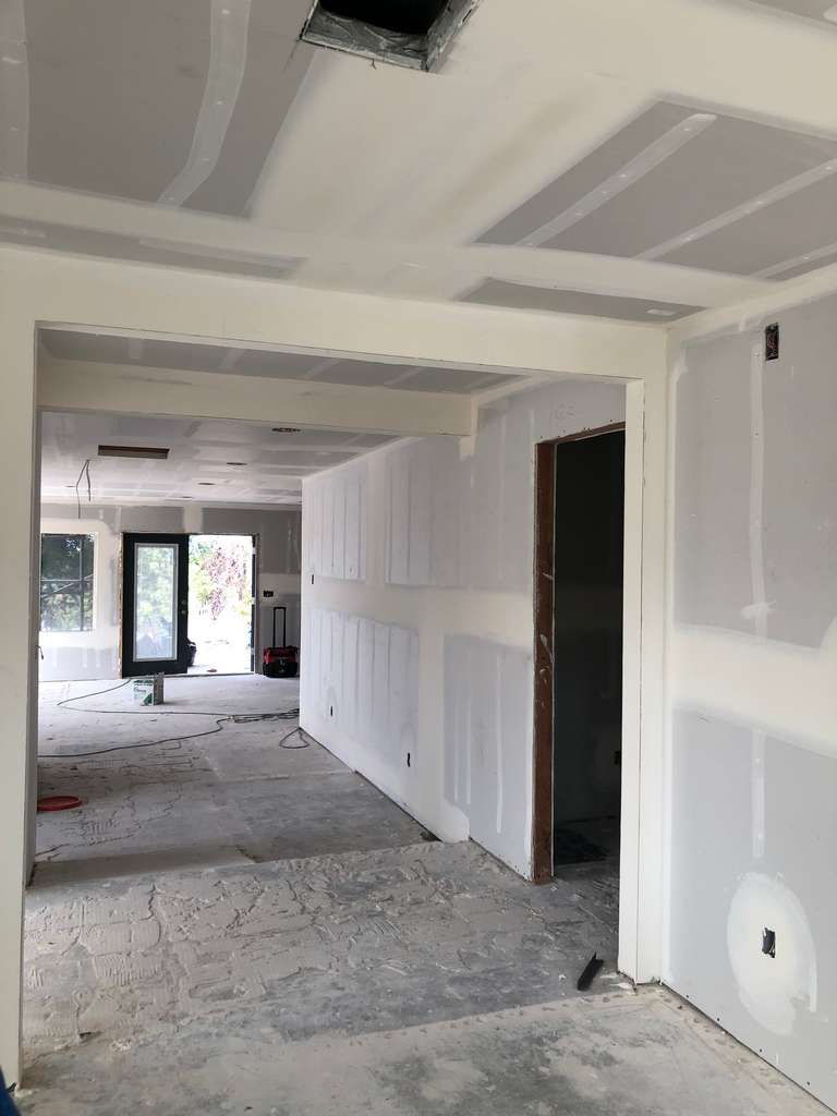 drywall-compound-applied-to-sheetrock-in-rooms-and-hallways